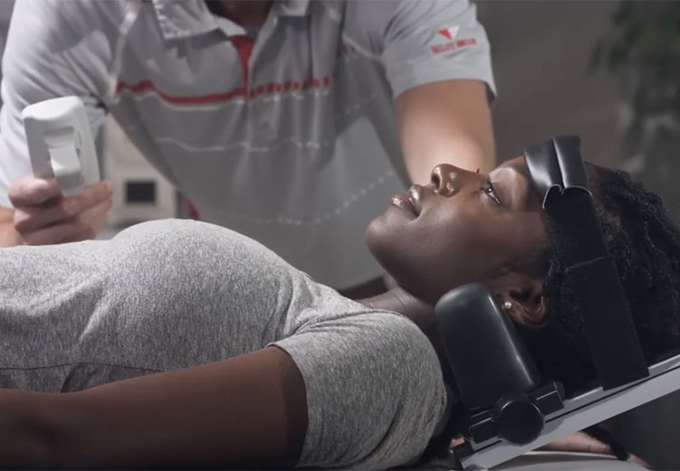 Patient on Triton 6M Spinal Decompression Table